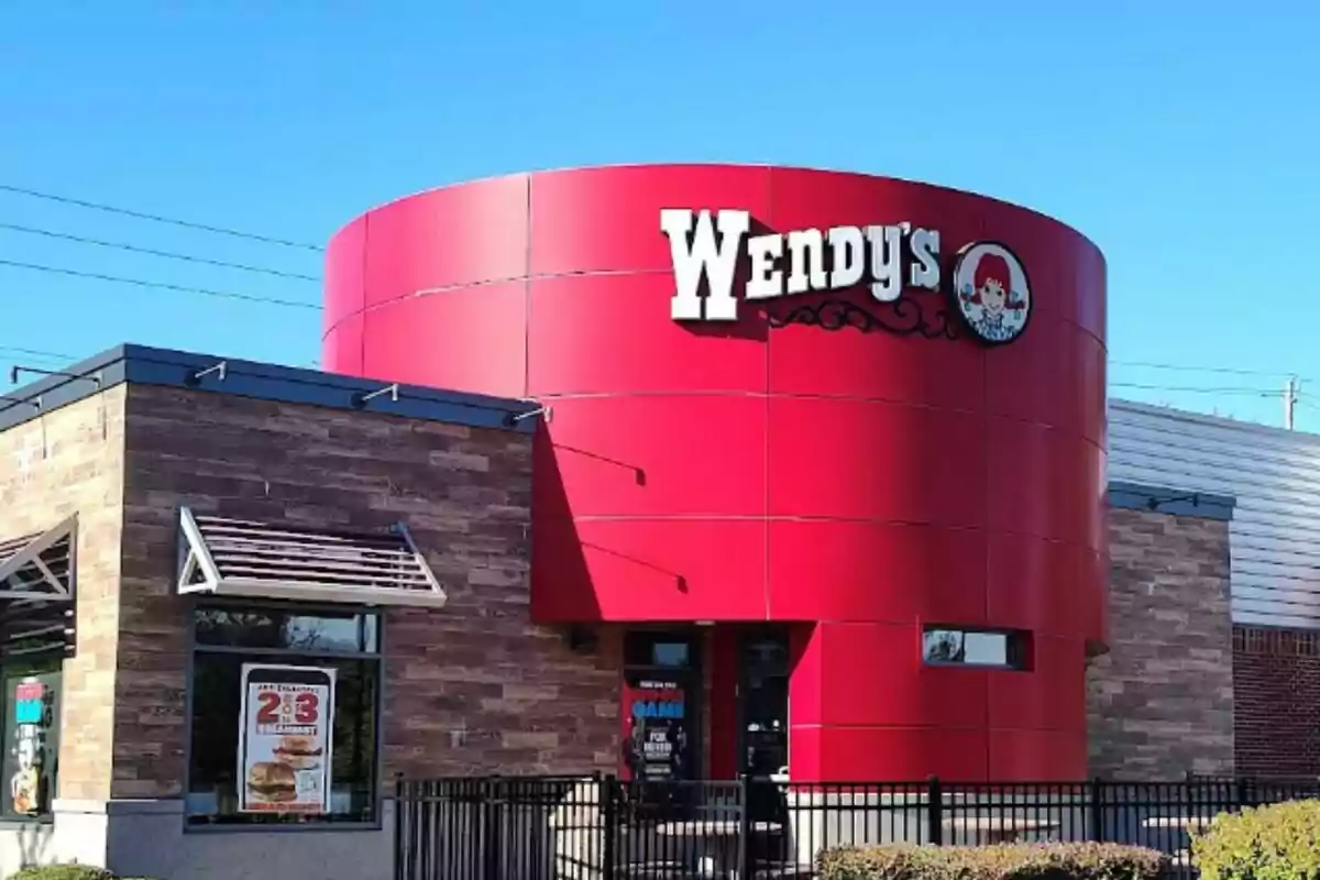 Wendy's, a fast-food restaurant with a modern design and a large sign on the facade in the United States.