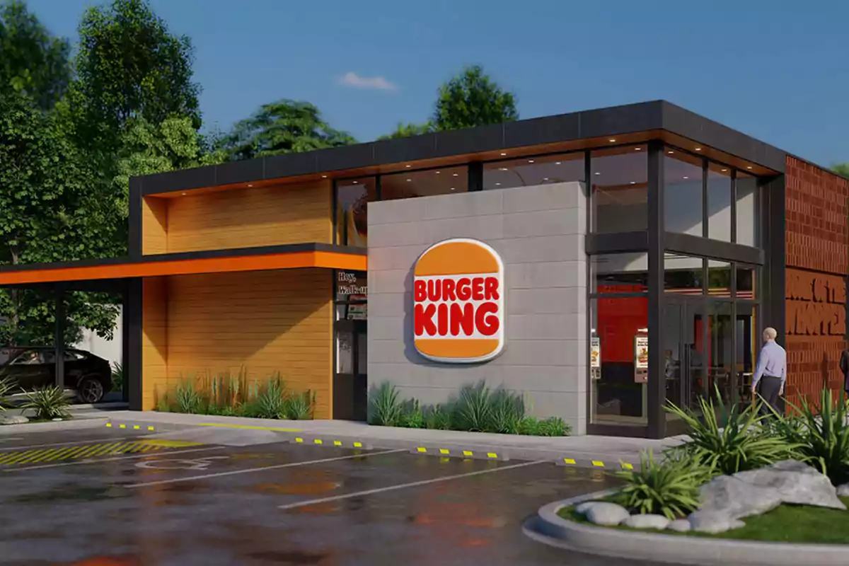 A fast-food restaurant with a modern design and a large sign on the facade. A fast-food restaurant with a modern design and a large sign on the facade.