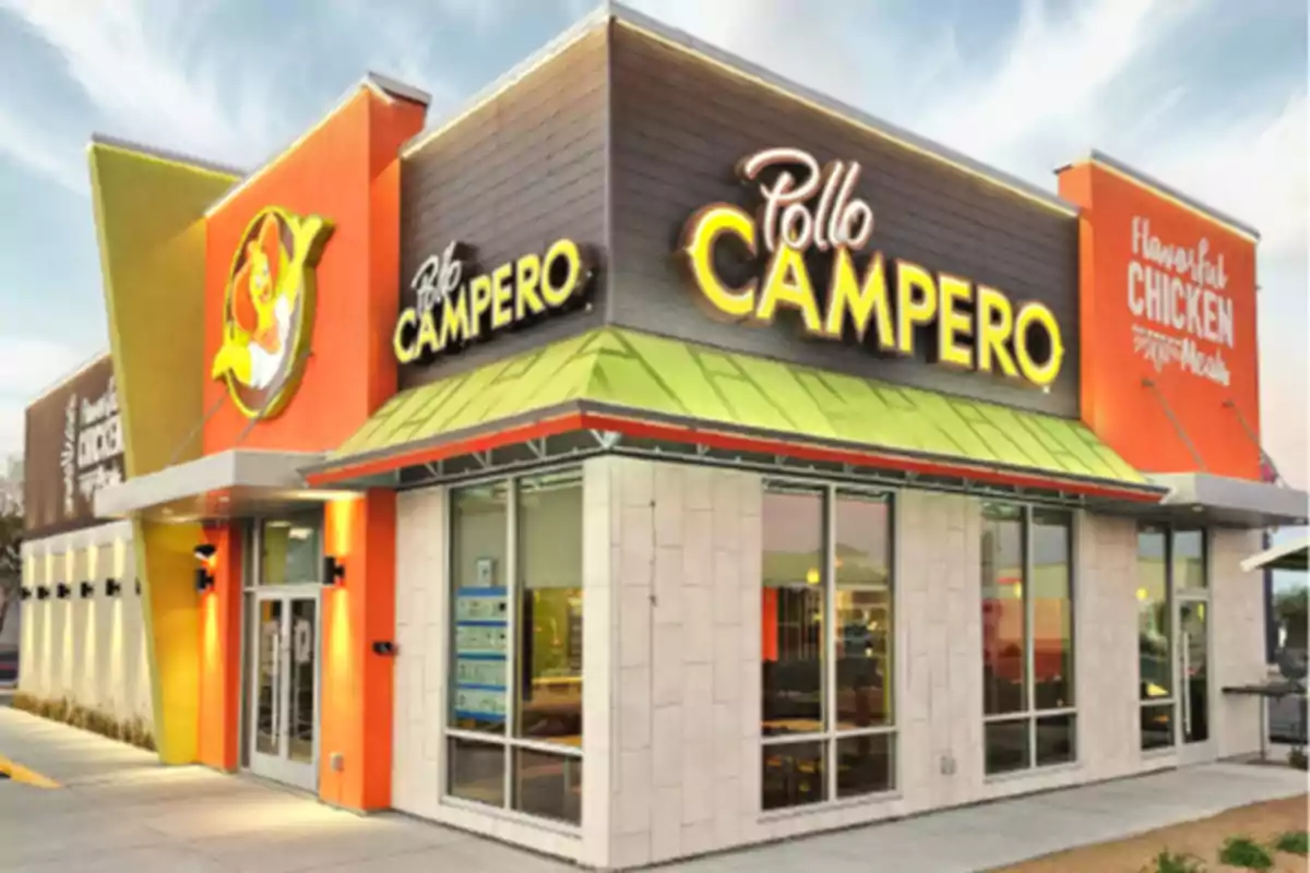 Facade of a fast food restaurant with a modern design and striking colors. Facade of a fast food restaurant with a modern design and striking colors.