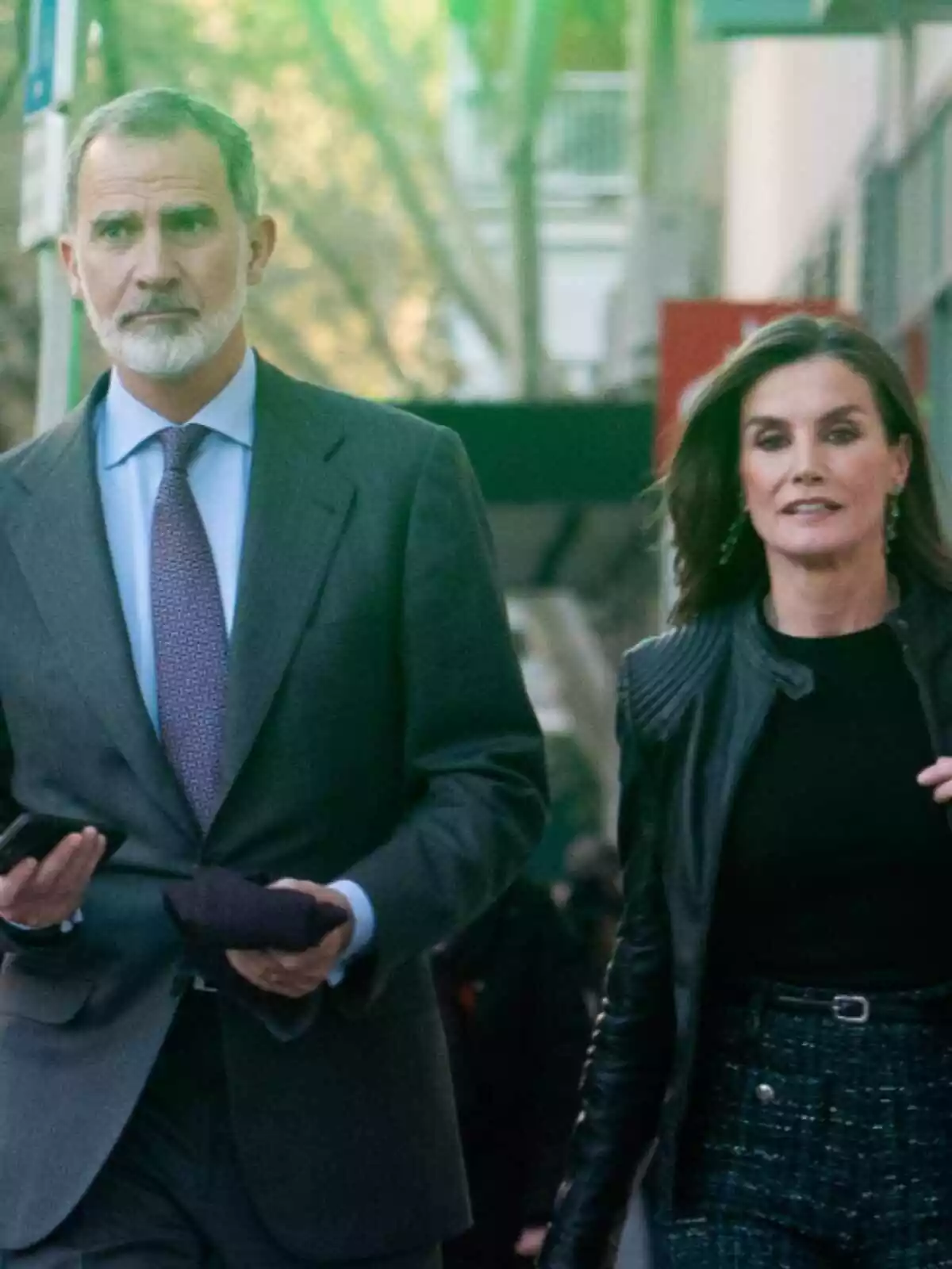 Felipe VI and Letizia serious walking down the street Felipe VI and Letizia serious walking down the street