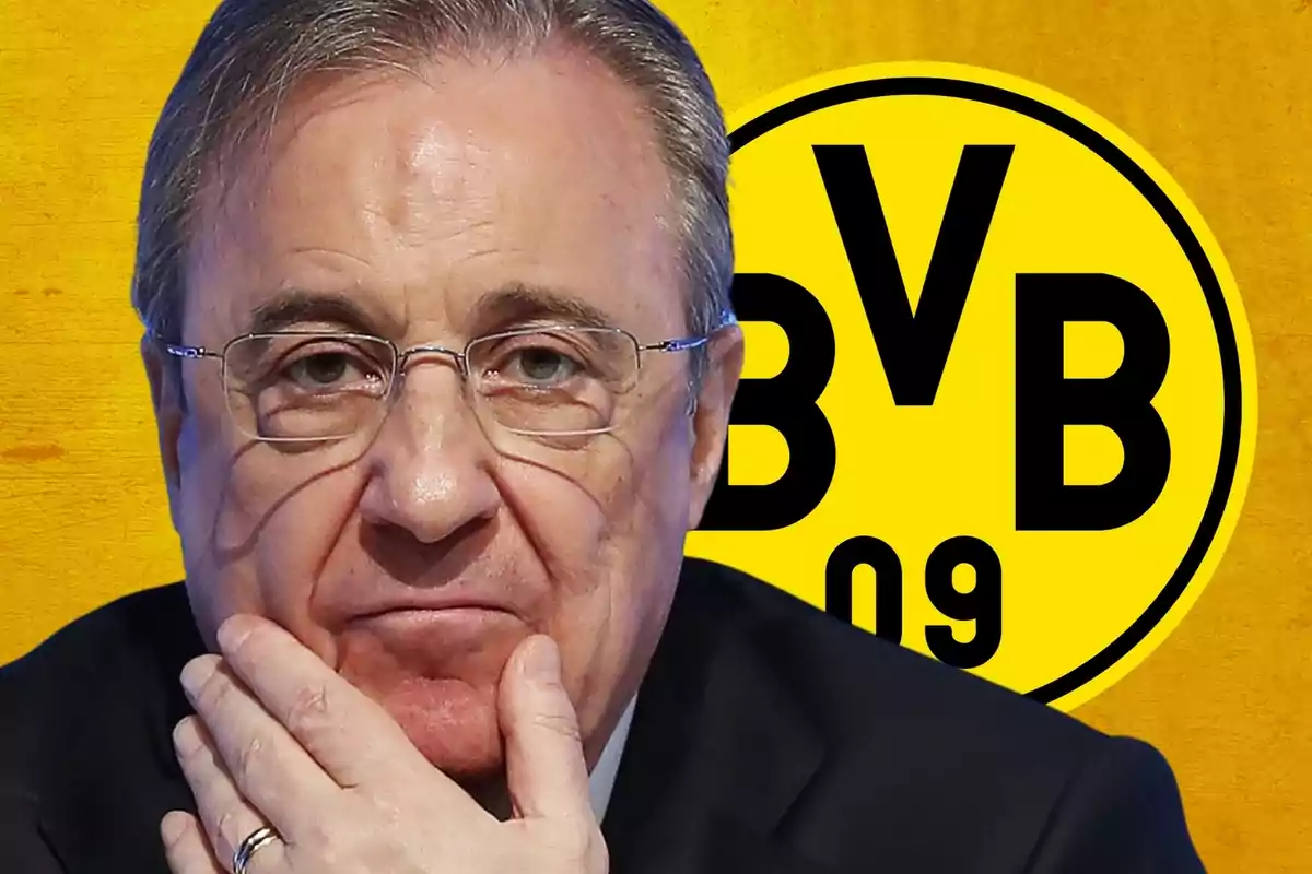 Hombre con gafas y expresión pensativa frente al logo del Borussia Dortmund.