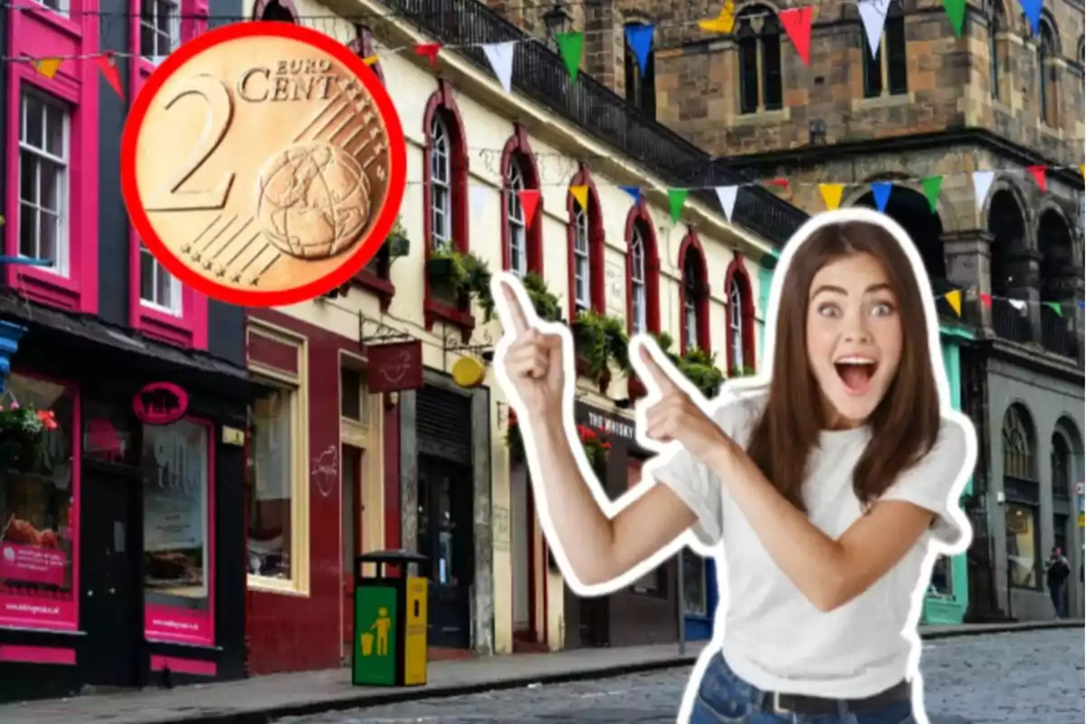 A smiling woman points to a 2-cent euro coin against a street background with colorful buildings and pennants.