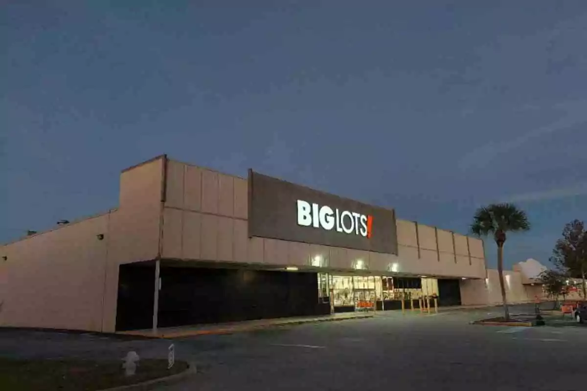 A commercial building with an illuminated sign that says 