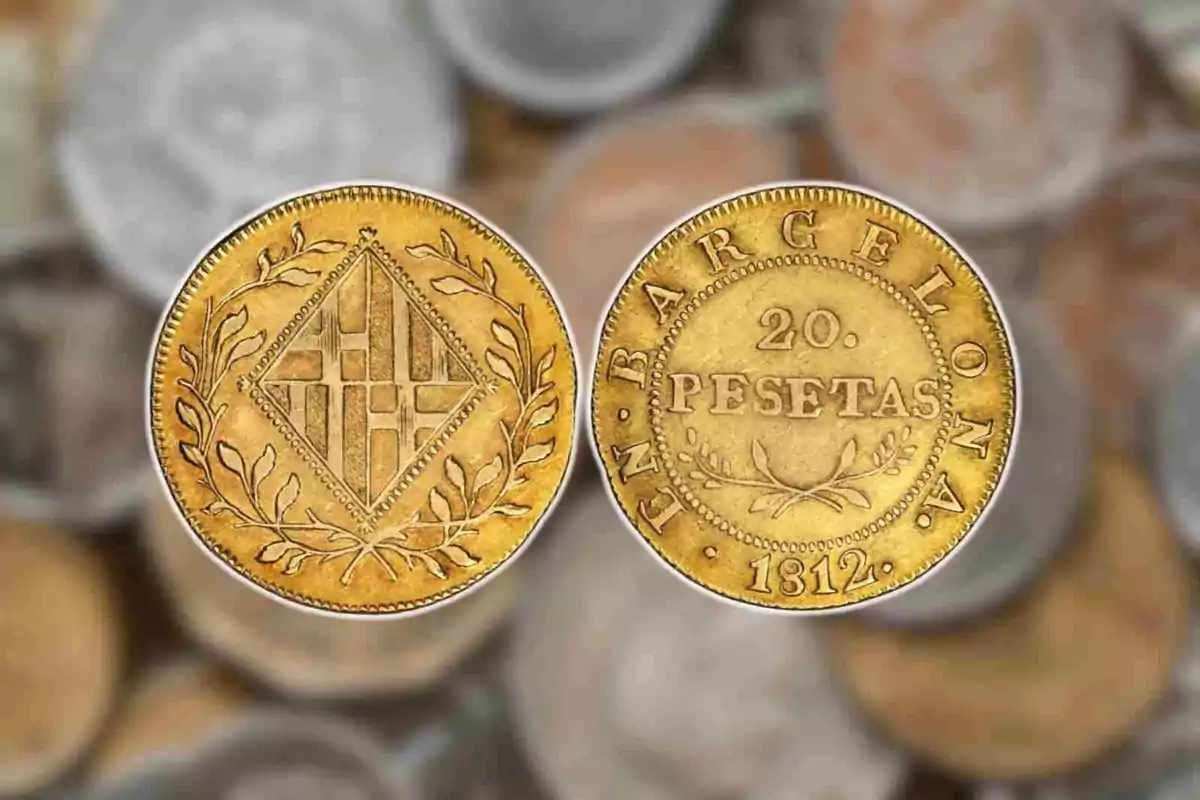 Moneda antigua de 20 pesetas de 1812 con diseño de escudo y laurel. Moneda antigua de 20 pesetas de 1812 con diseño de escudo y laurel.