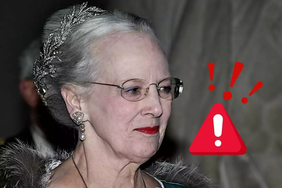 An elderly person with glasses and a tiara, next to a red warning icon.