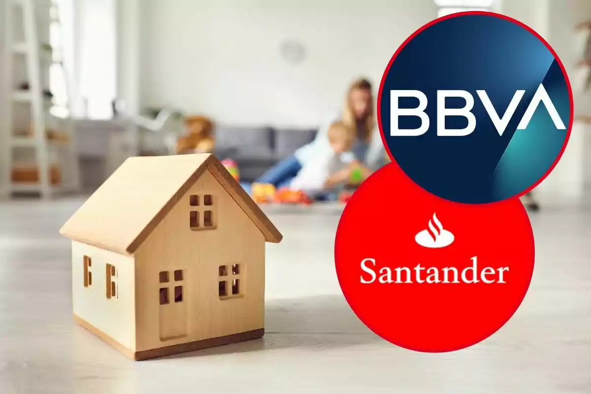 Casa de juguete de madera en primer plano con logotipos de BBVA y Santander en un entorno hogareño desenfocado.