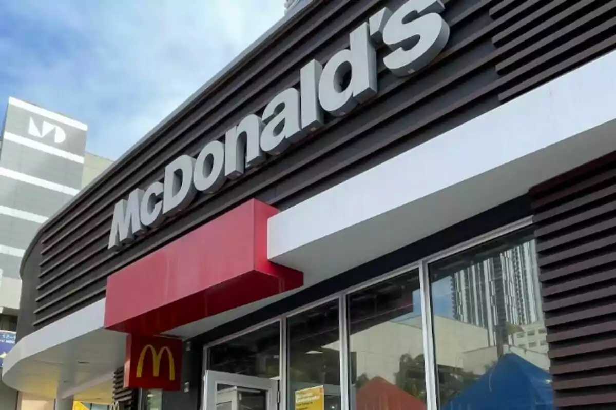Facade of a McDonald's restaurant with a large sign on top.