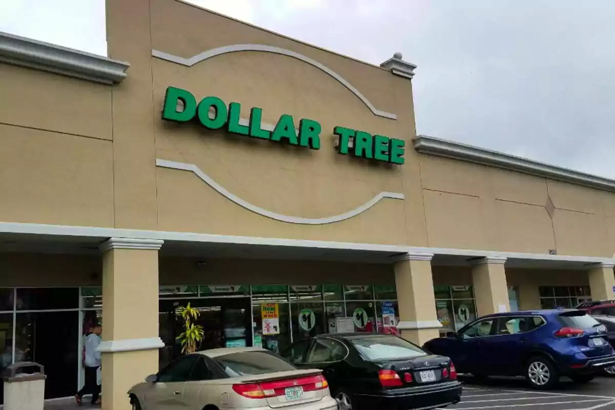 Dollar Tree store facade with several cars parked in front. Dollar Tree store facade with several cars parked in front.