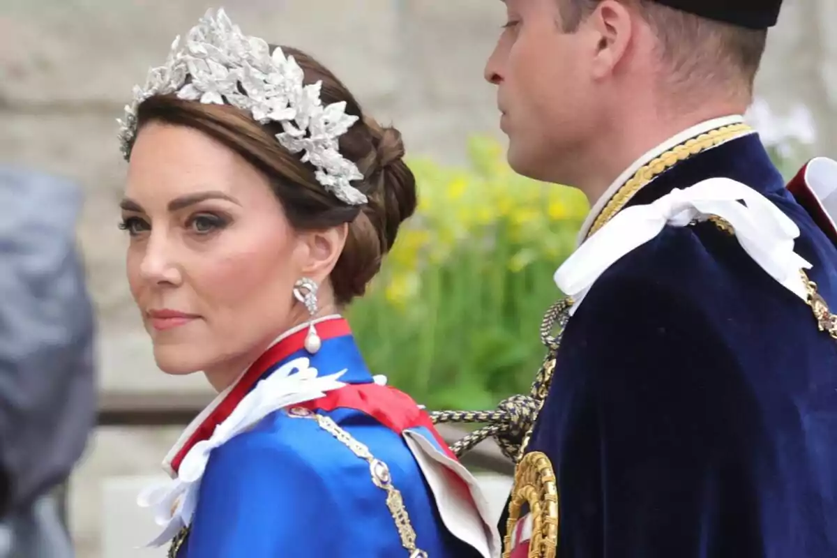 A woman with an elegant tiara and a man in formal attire at an outdoor event. A woman with an elegant tiara and a man in formal attire at an outdoor event.