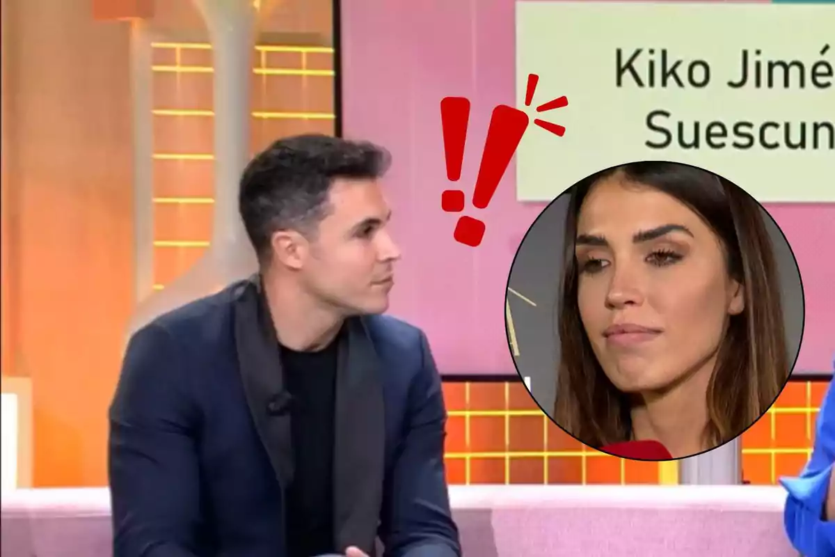 Kiko Jiménez sentado en un set de televisión con un gráfico que muestra signos de exclamación y un recuadro con el rostro de Sofía Suescun.