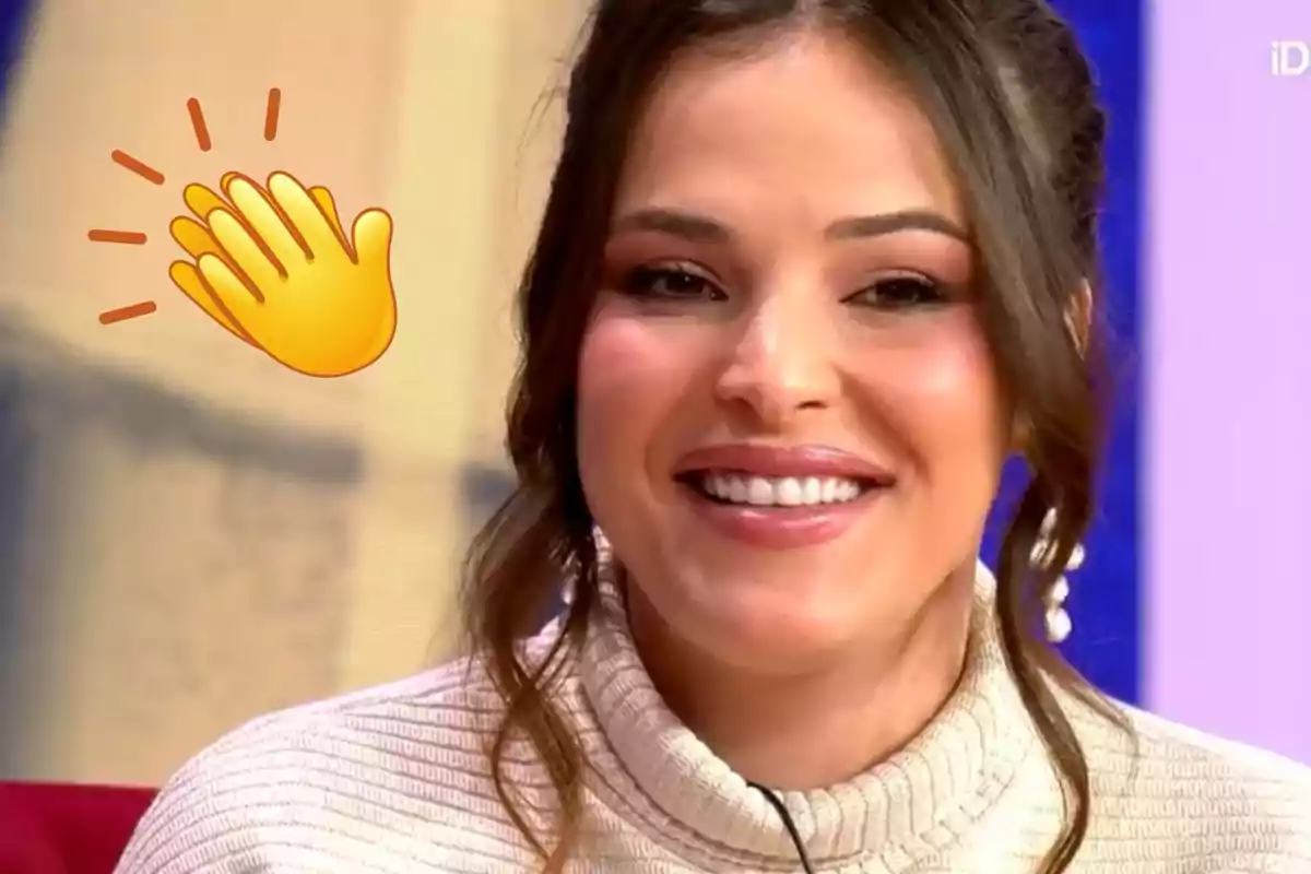 A person smiling with a clapping emoji next to them.