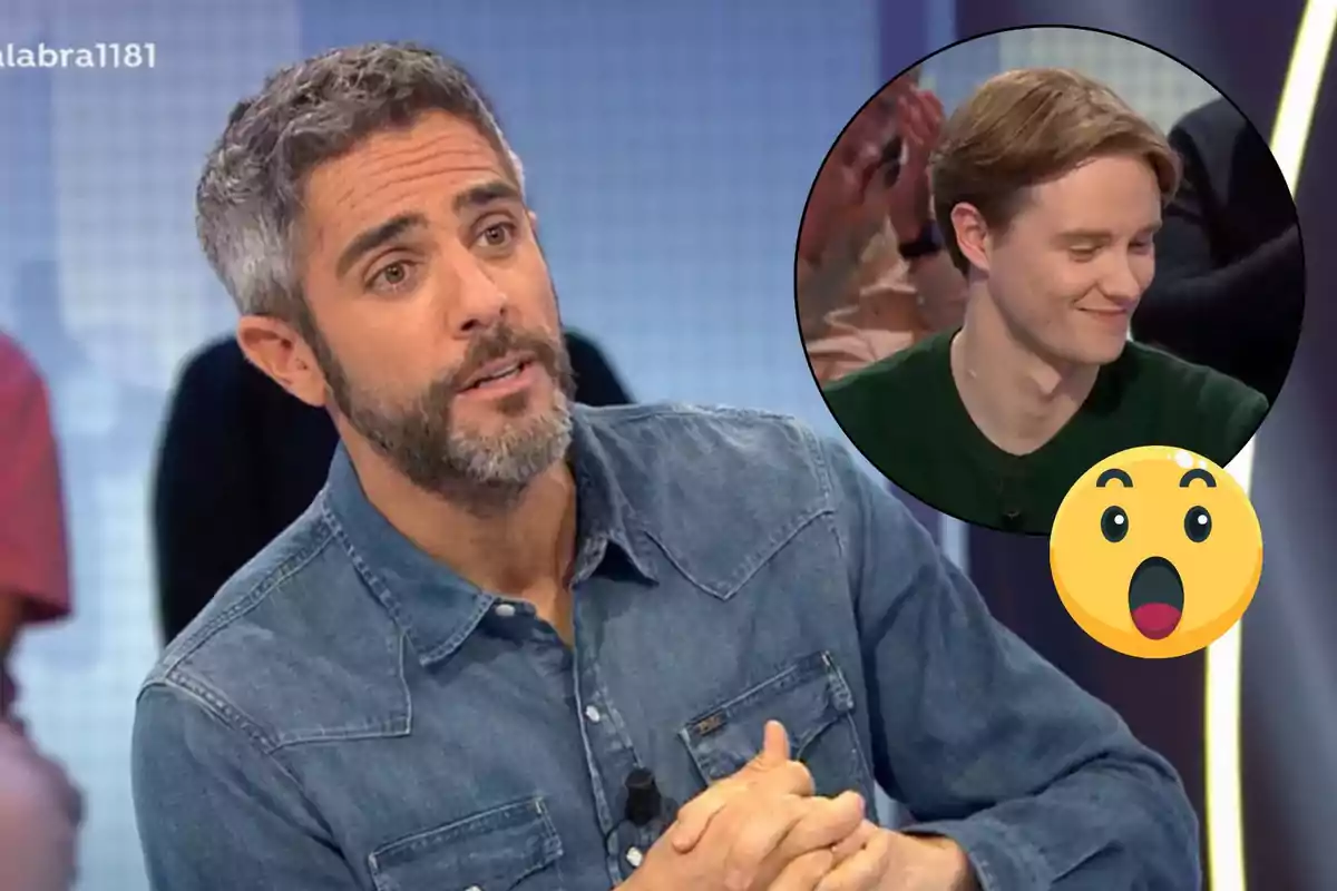 Roberto Leal con barba y camisa de mezclilla está hablando en un programa de televisión, mientras en un recuadro aparece Manu sonriendo, acompañado de un emoji sorprendido.