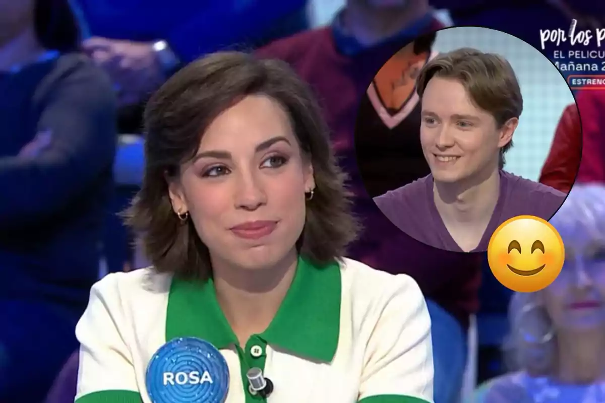 Rosa con una etiqueta que dice "Rosa" está en un programa de televisión, mientras Manu sonriente aparece en un círculo superpuesto junto a un emoji sonriente.