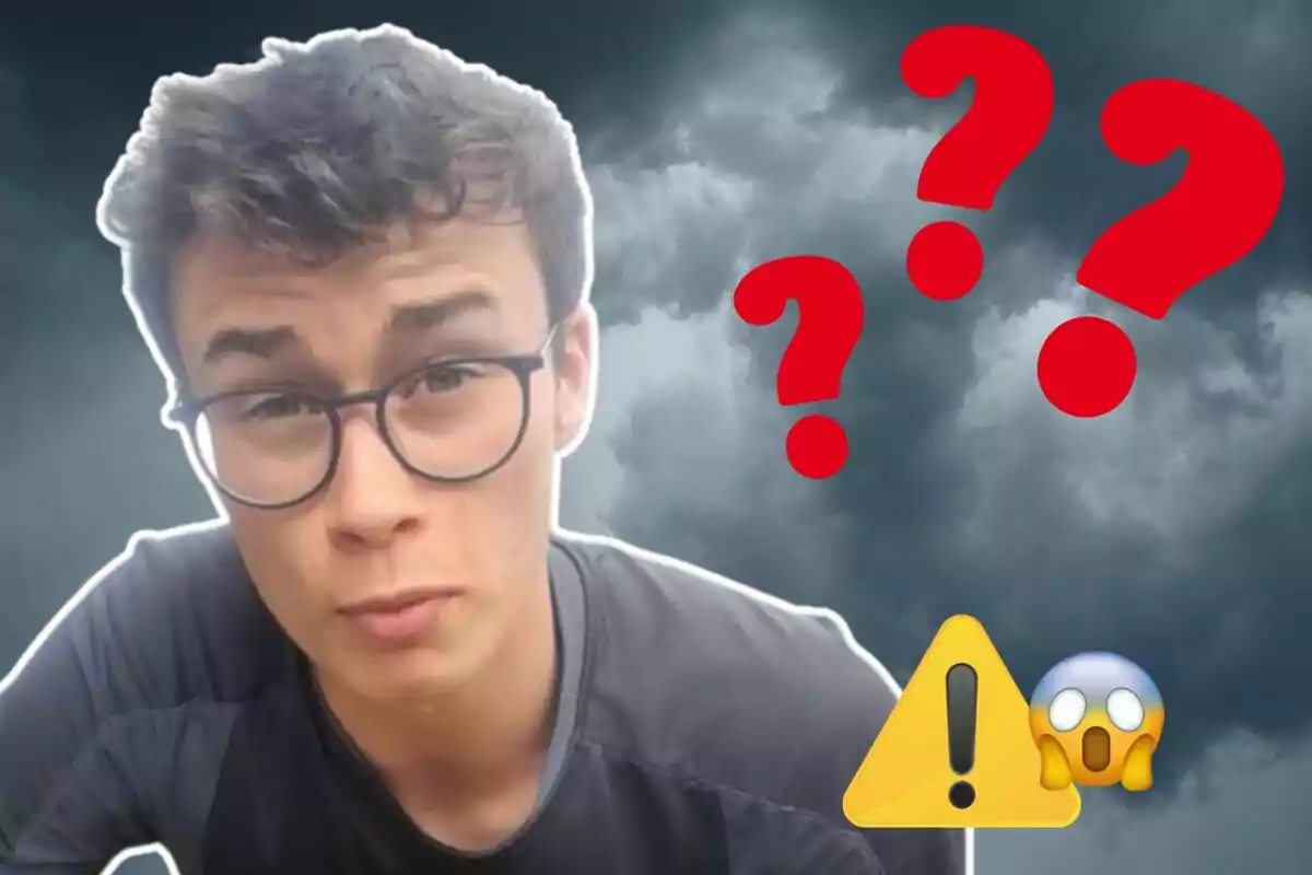 Young man with glasses and serious expression, cloudy sky background with red question marks and warning and surprise emojis.