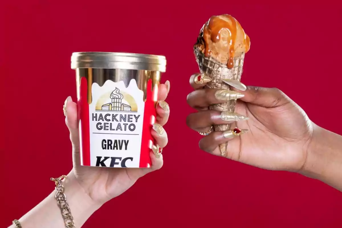 Two hands hold an ice cream container and a cone with ice cream covered in sauce against a red background. Two hands hold an ice cream container and a cone with ice cream covered in sauce against a red background.