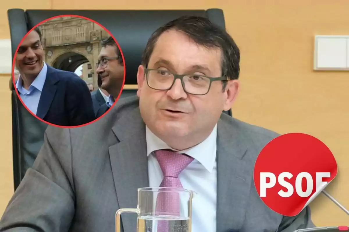 Un hombre con gafas y traje gris, sentado en una silla, con un logo del PSOE en la esquina inferior derecha y una imagen circular en la esquina superior izquierda mostrando a dos personas sonriendo.