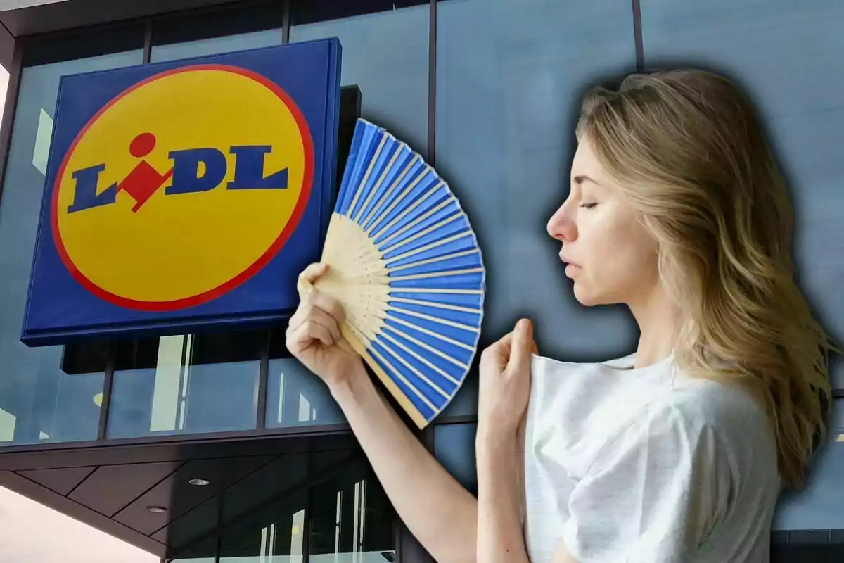 Una mujer usando un abanico frente a un edificio con el logo de Lidl.