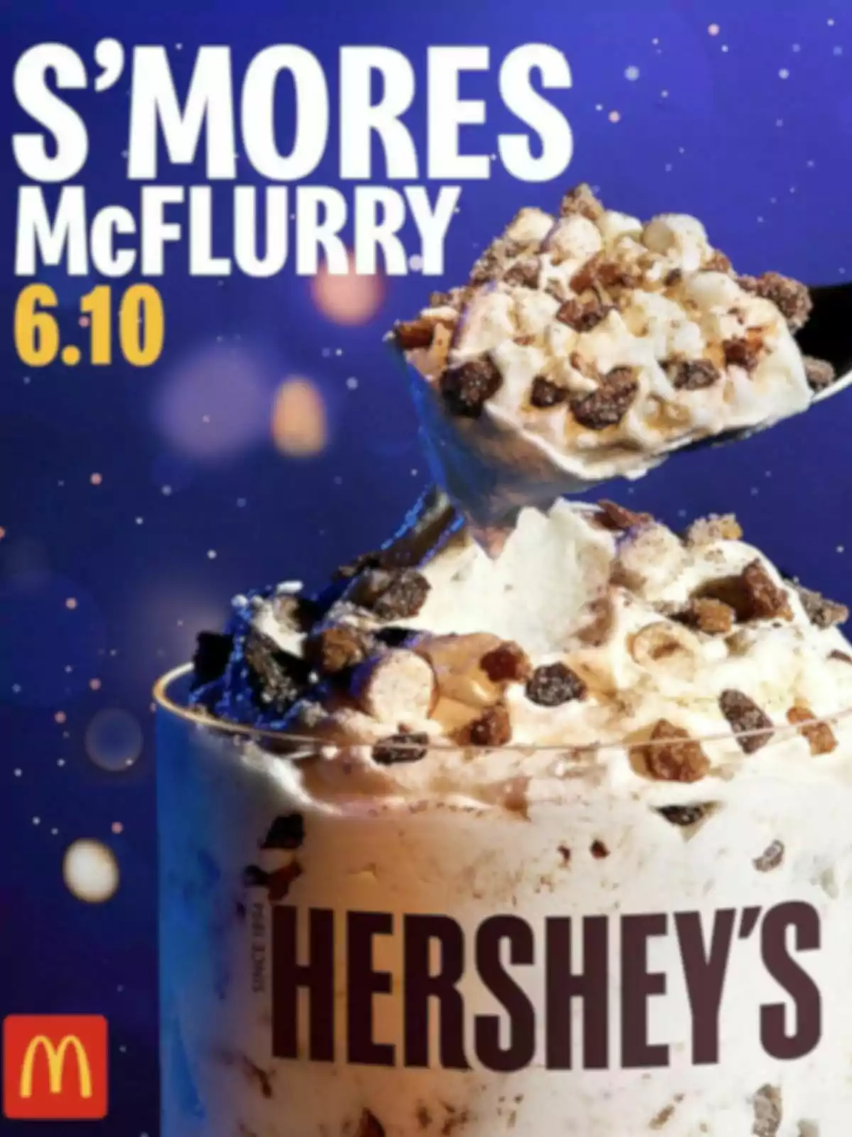 Hershey’s S’mores McFlurry cup from McDonald’s with ice cream and pieces of cookie and chocolate on a blue background Hershey’s S’mores McFlurry cup from McDonald’s with ice cream and pieces of cookie and chocolate on a blue background