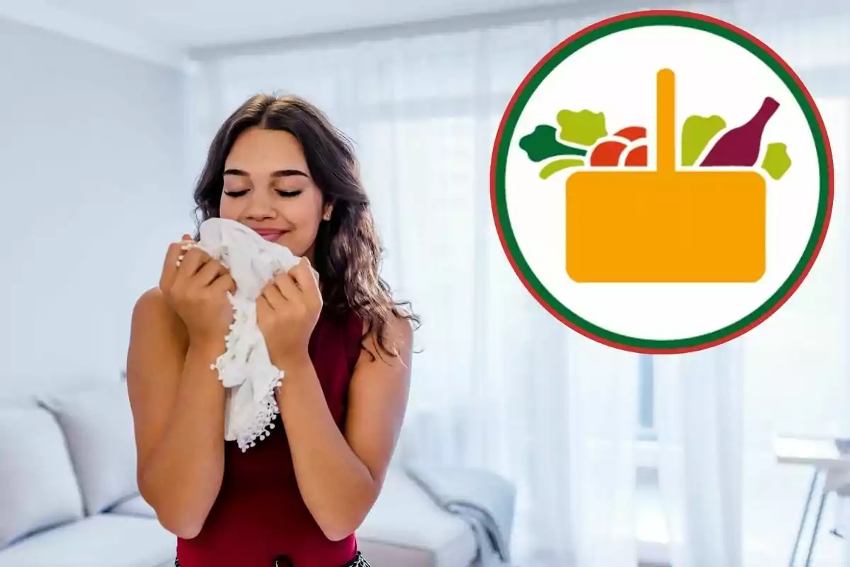 Una mujer disfrutando del aroma de una prenda de ropa limpia con un ícono de una cesta de compras llena de alimentos en la esquina superior derecha.