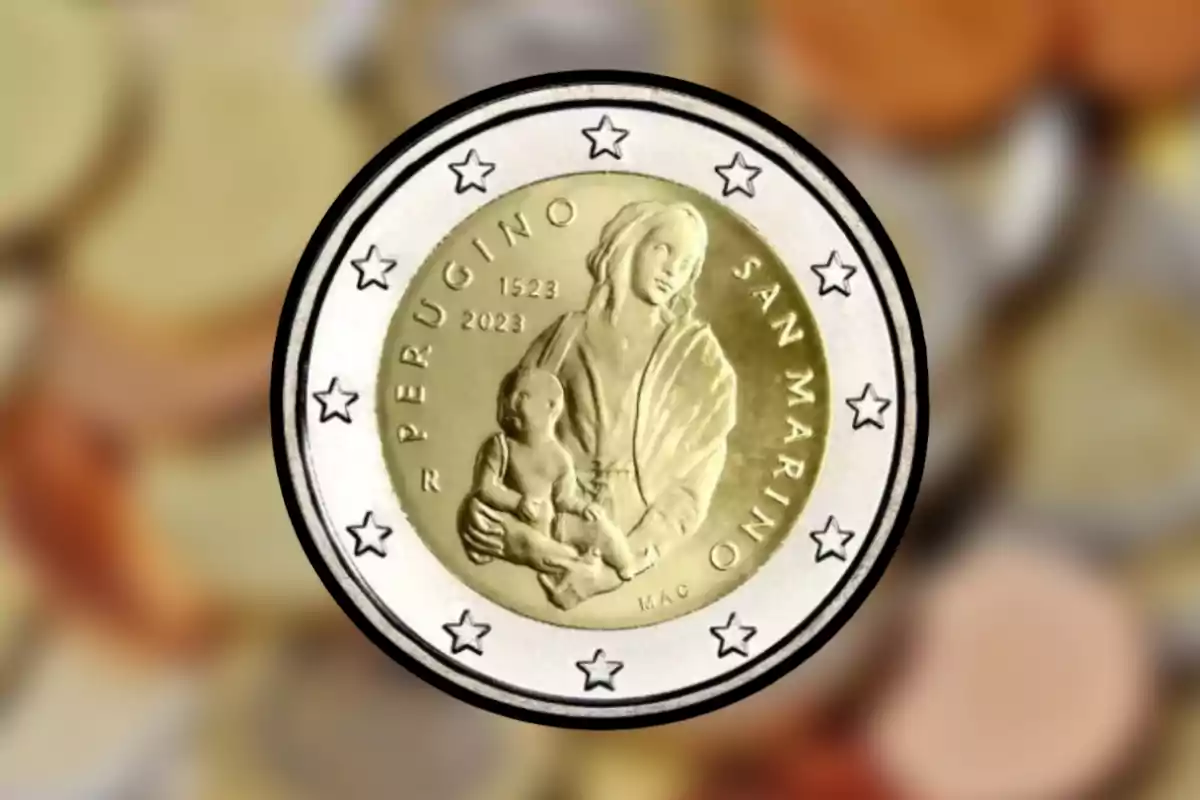 Moneda conmemorativa de San Marino con la imagen de una mujer sosteniendo a un niño rodeada de estrellas y las inscripciones Perugino y las fechas 1523 y 2023 Moneda conmemorativa de San Marino con la imagen de una mujer sosteniendo a un niño rodeada de estrellas y las inscripciones Perugino y las fechas 1523 y 2023