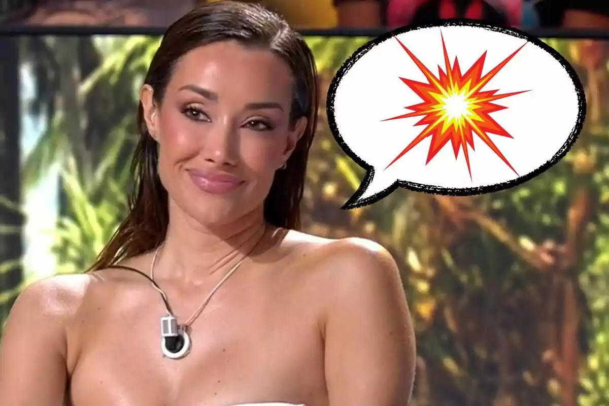 A woman smiles while wearing a microphone around her neck and there&#39;s a speech bubble with an explosion drawn on it.