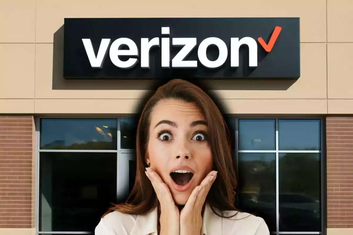 A person with a surprised expression in front of a Verizon store. A person with a surprised expression in front of a Verizon store.
