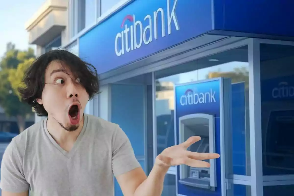 A man with a surprised expression in front of a Citibank ATM.