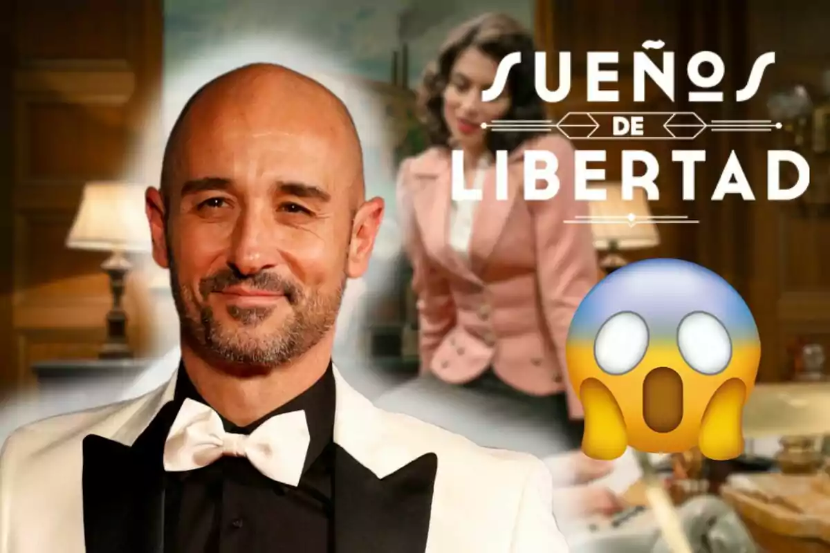 Alain Hernández con barba y esmoquin blanco sonríe frente a un fondo con una mujer y el texto "Sueños de Libertad", acompañado de un emoji de sorpresa.