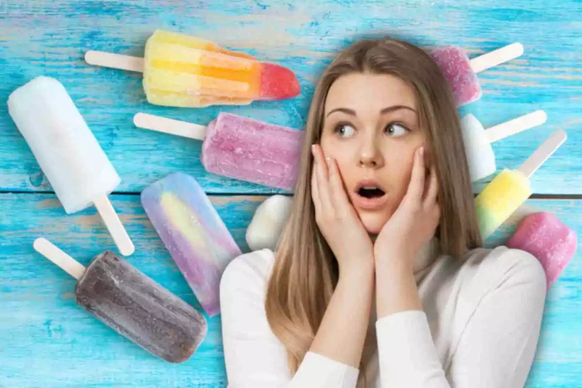 Una mujer con expresión de sorpresa rodeada de paletas de hielo de colores sobre un fondo azul.