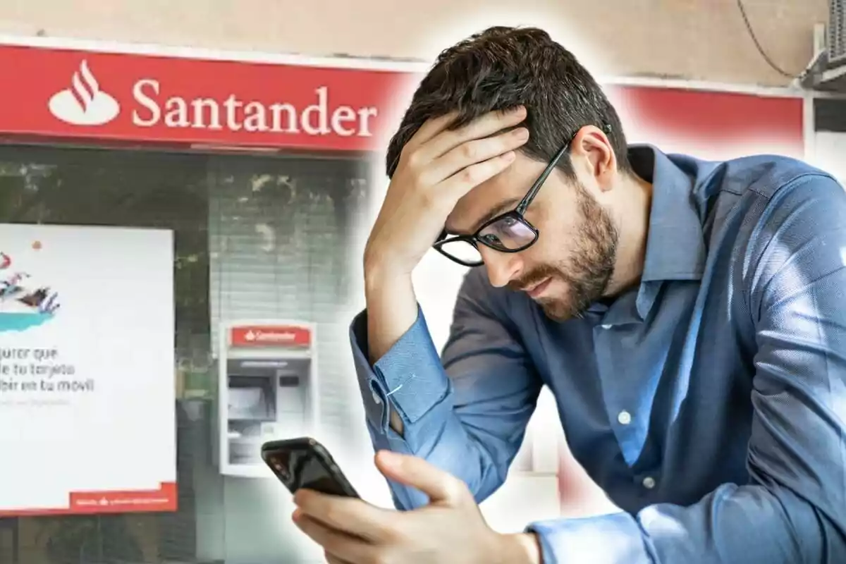 Hombre preocupado mirando su teléfono frente a una sucursal del Banco Santander.