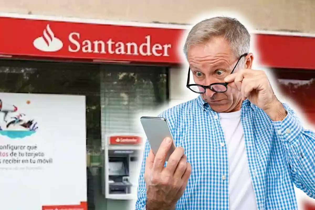 Man caught looking at his phone in front of a Santander Bank branch.