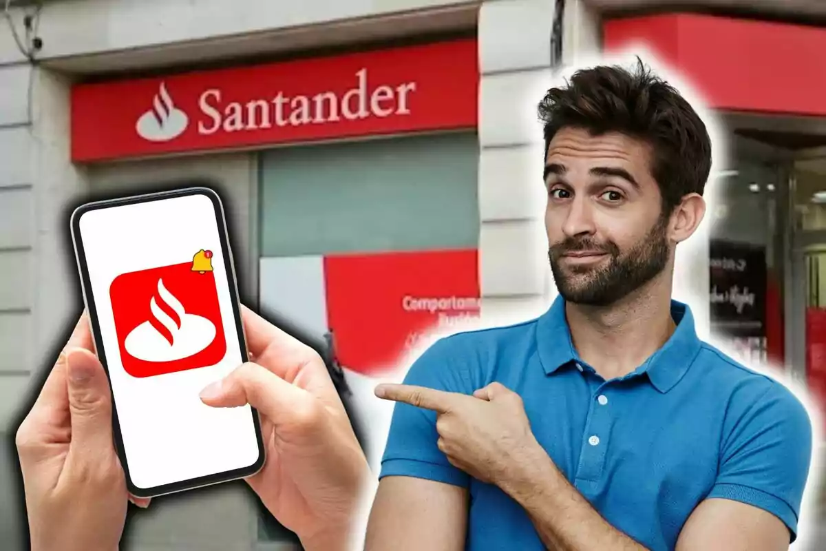 Un hombre con camisa azul señala un teléfono móvil que muestra el logo del Banco Santander frente a una sucursal de la entidad bancaria.