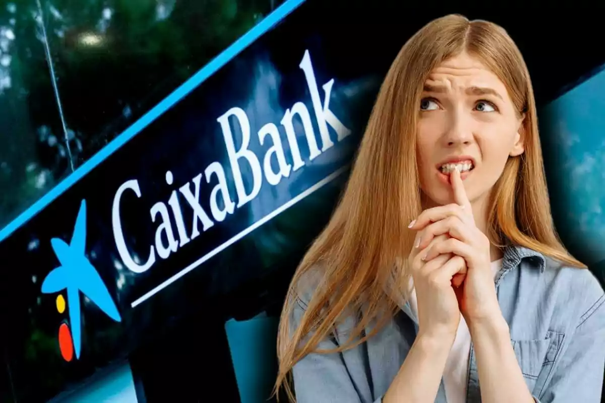 Mujer pensativa frente a un cartel de CaixaBank.