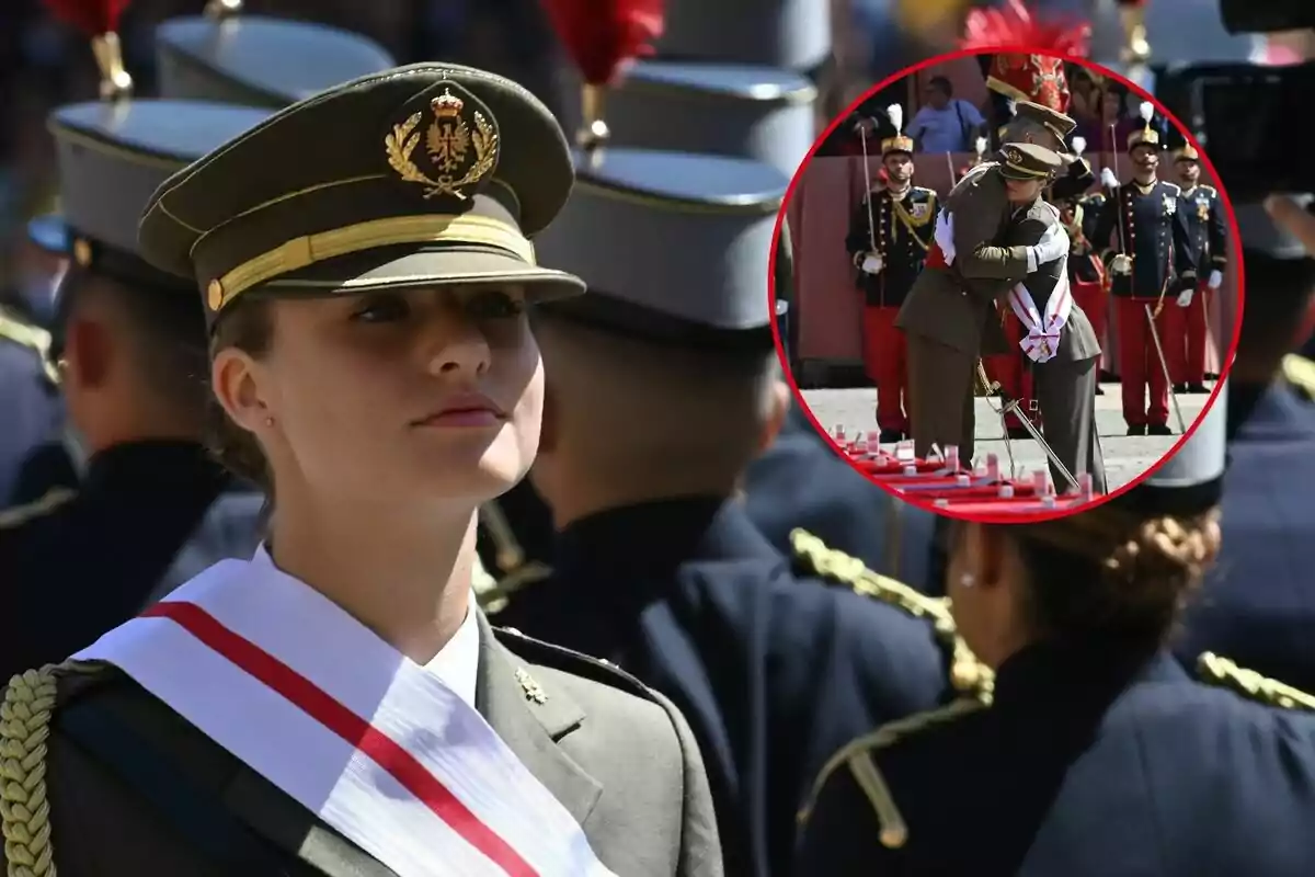 Leonor cadete con uniforme militar y una banda blanca con una franja roja, en el fondo se observa su abrazo con Felipe VI.