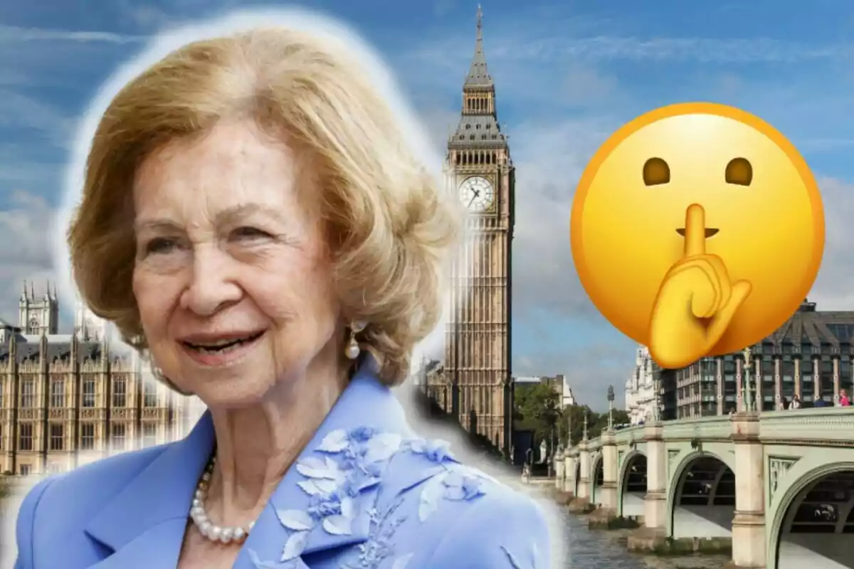 La reina Sofía sonriente con cabello rubio y un traje azul claro frente al Big Ben en Londres con un emoji de silencio al lado.