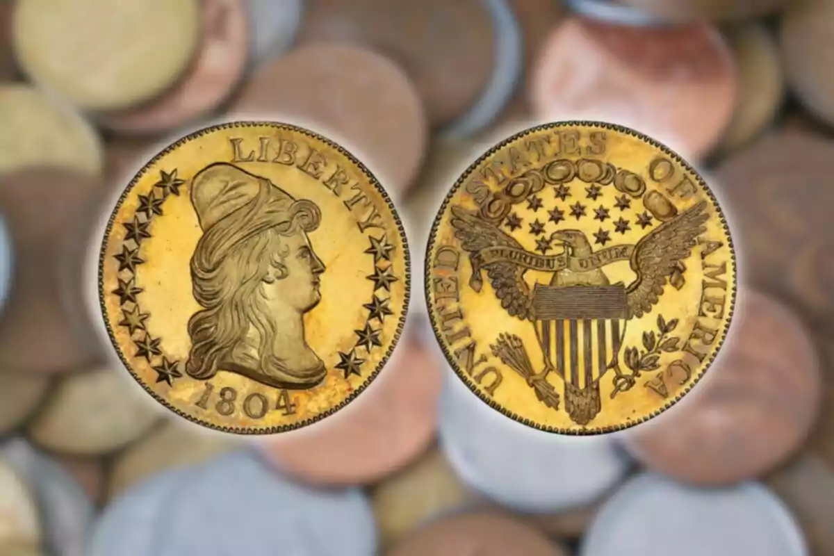 1804 antique coin with a profile bust design and an eagle on the reverse against a background of other blurred coins. 1804 antique coin with a profile bust design and an eagle on the reverse against a background of other blurred coins.