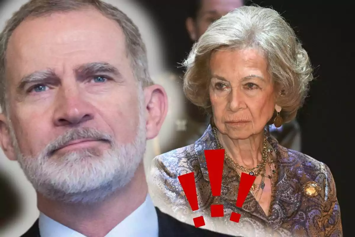 Felipe VI con expresión seria y la reina Sofía con gesto serio, acompañada de signos de exclamación rojos.