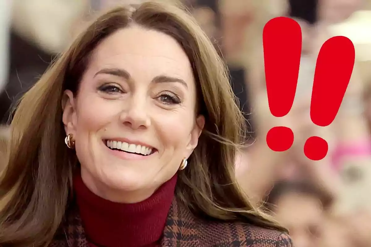 Kate Middleton smiling with red exclamation marks next to her.