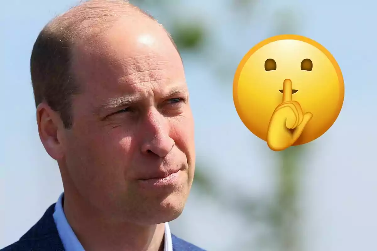 Prince William with a serious expression outdoors next to a silence emoji.