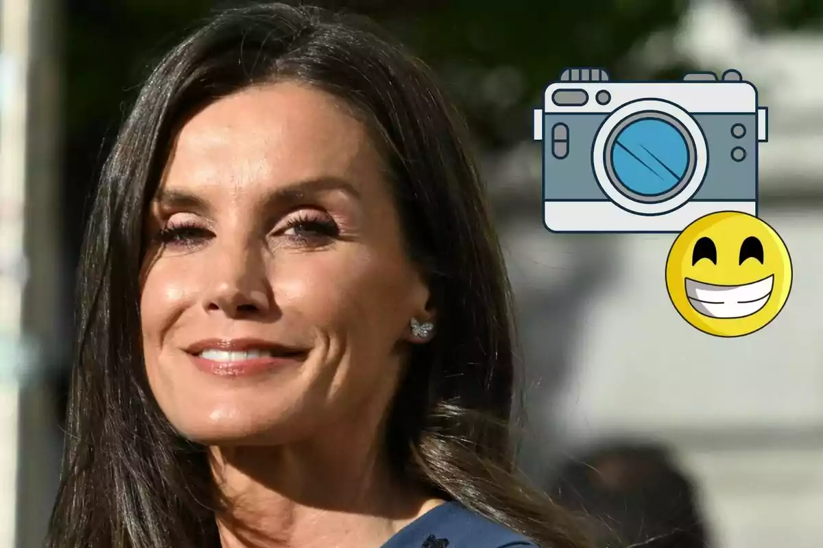 Queen Letizia smiling with a drawing of a camera and a happy face in the top right corner