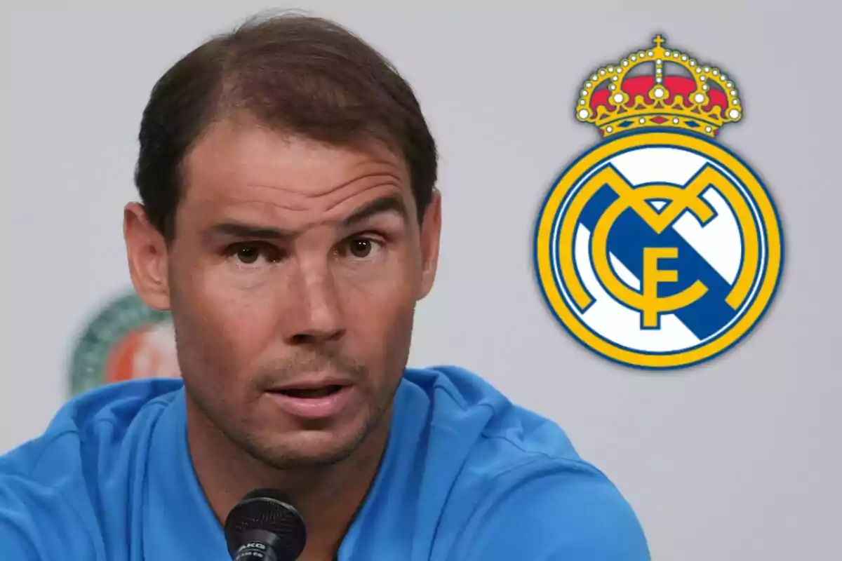 Rafa Nadal en una conferencia de prensa con el logo del Real Madrid al fondo.