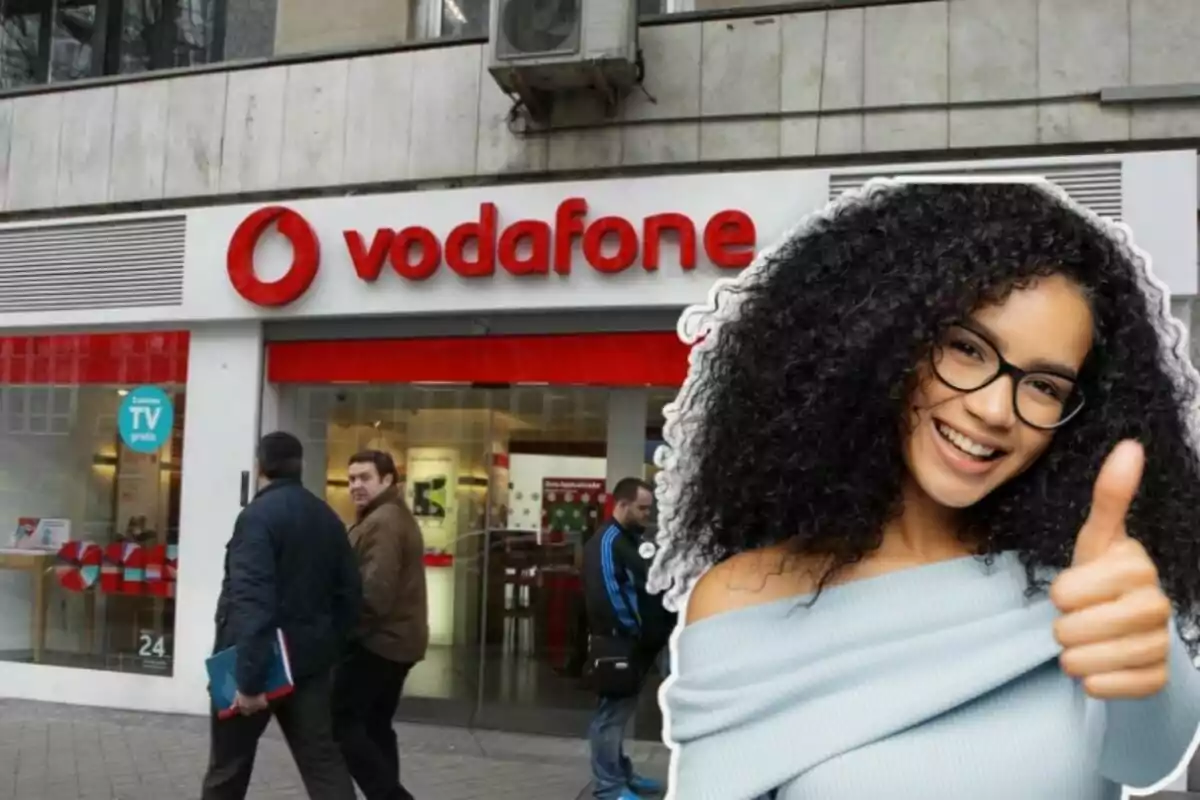 Una tienda de Vodafone y en la derecha una chica con el pulgar en alto