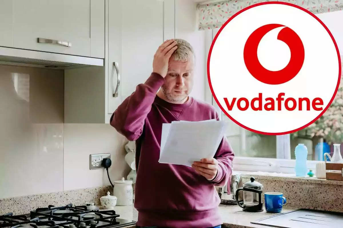 Un hombre revisa una factura, con la mano en la cabeza, y en el círculo, el logo de Vodafone