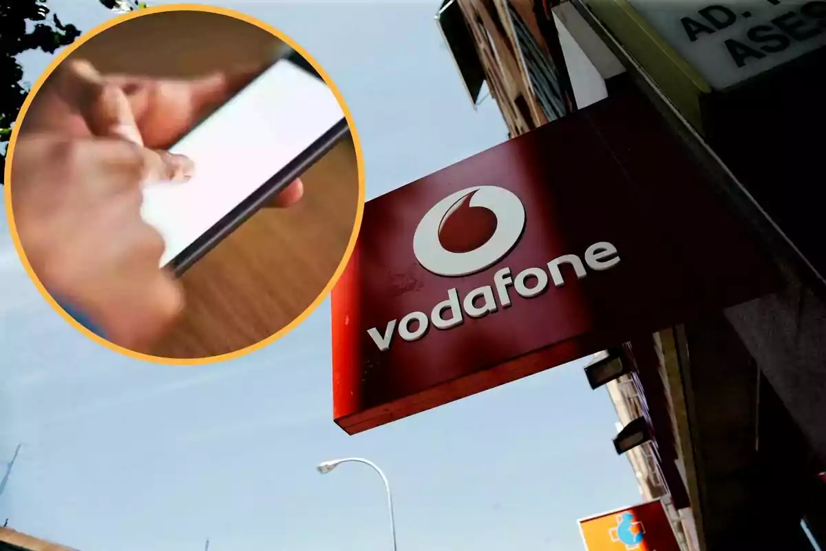 Un letrero de Vodafone y en el círculo, un móvil