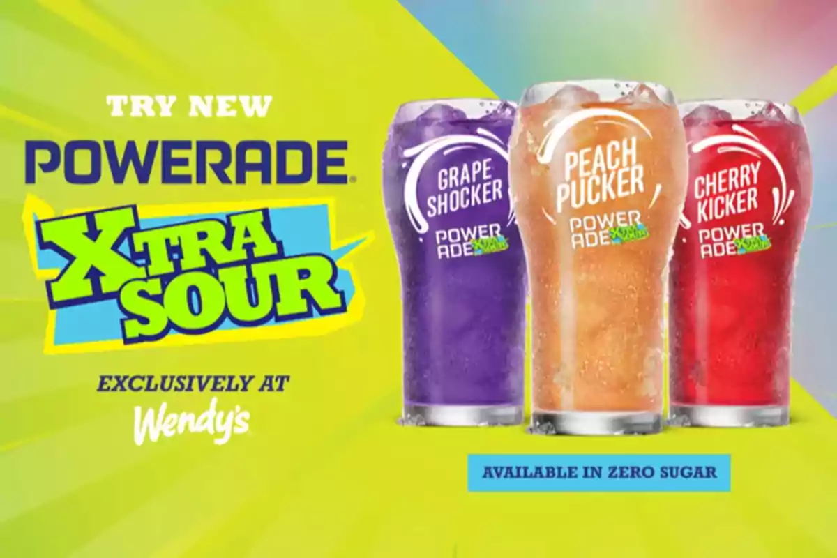 Three glasses of Powerade Xtra Sour drinks in grape, peach, and cherry flavors on a colorful background with Wendy's promotional text Three glasses of Powerade Xtra Sour drinks in grape, peach, and cherry flavors on a colorful background with Wendy's promotional text