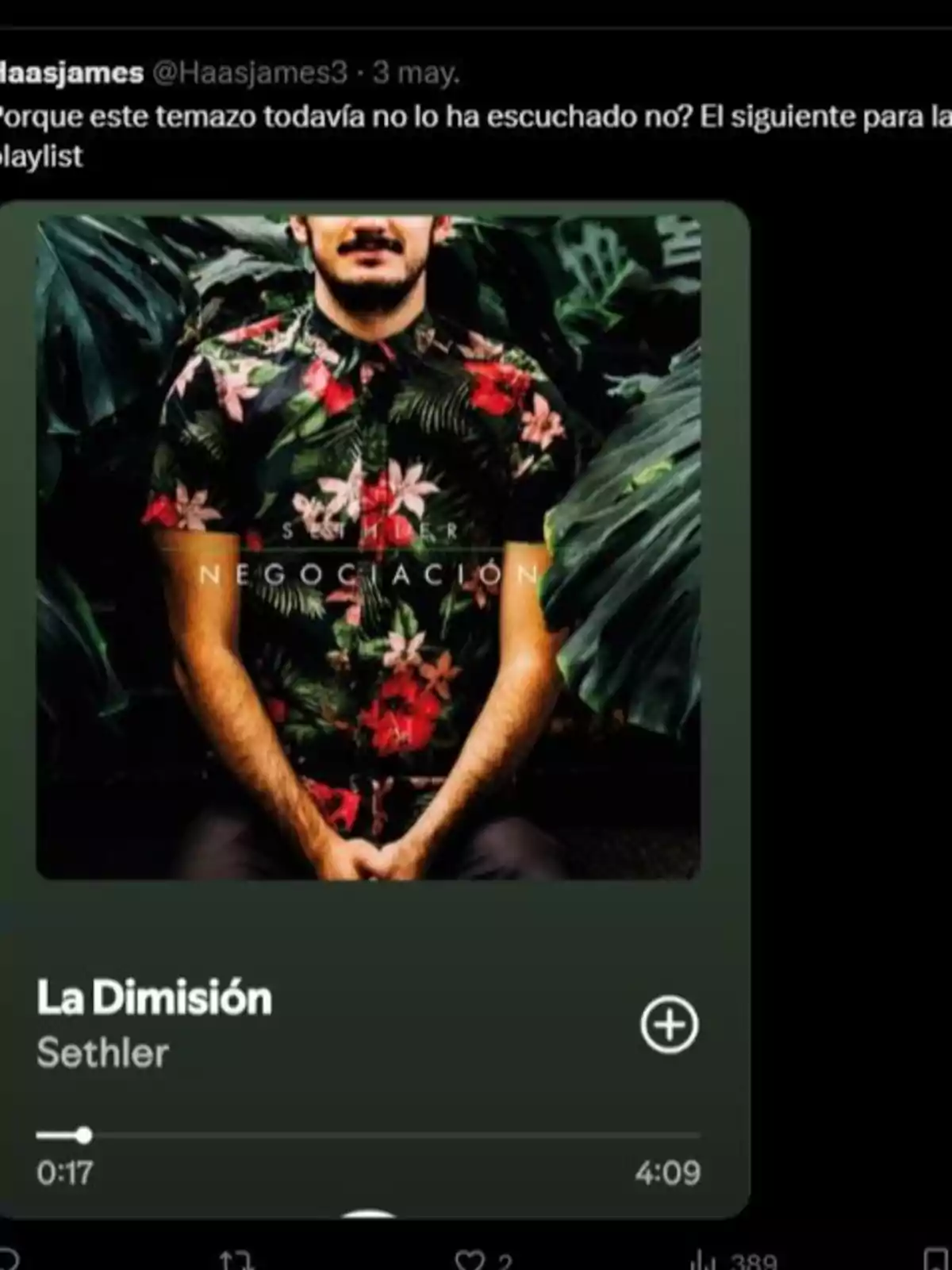 Una publicación de Twitter muestra una recomendación musical con la imagen de un hombre con camisa de flores y el título de la canción Una publicación de Twitter muestra una recomendación musical con la imagen de un hombre con camisa de flores y el título de la canción