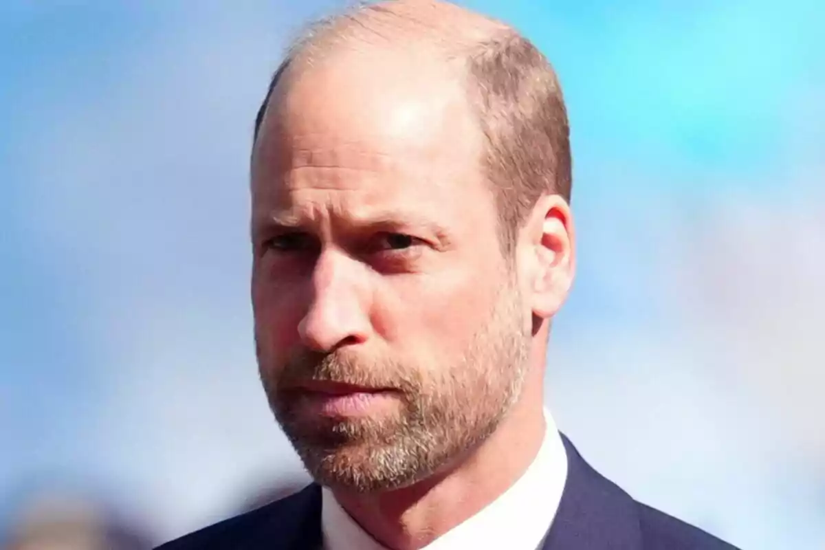 Close-up of a serious Prince William in a blue suit Close-up of a serious Prince William in a blue suit