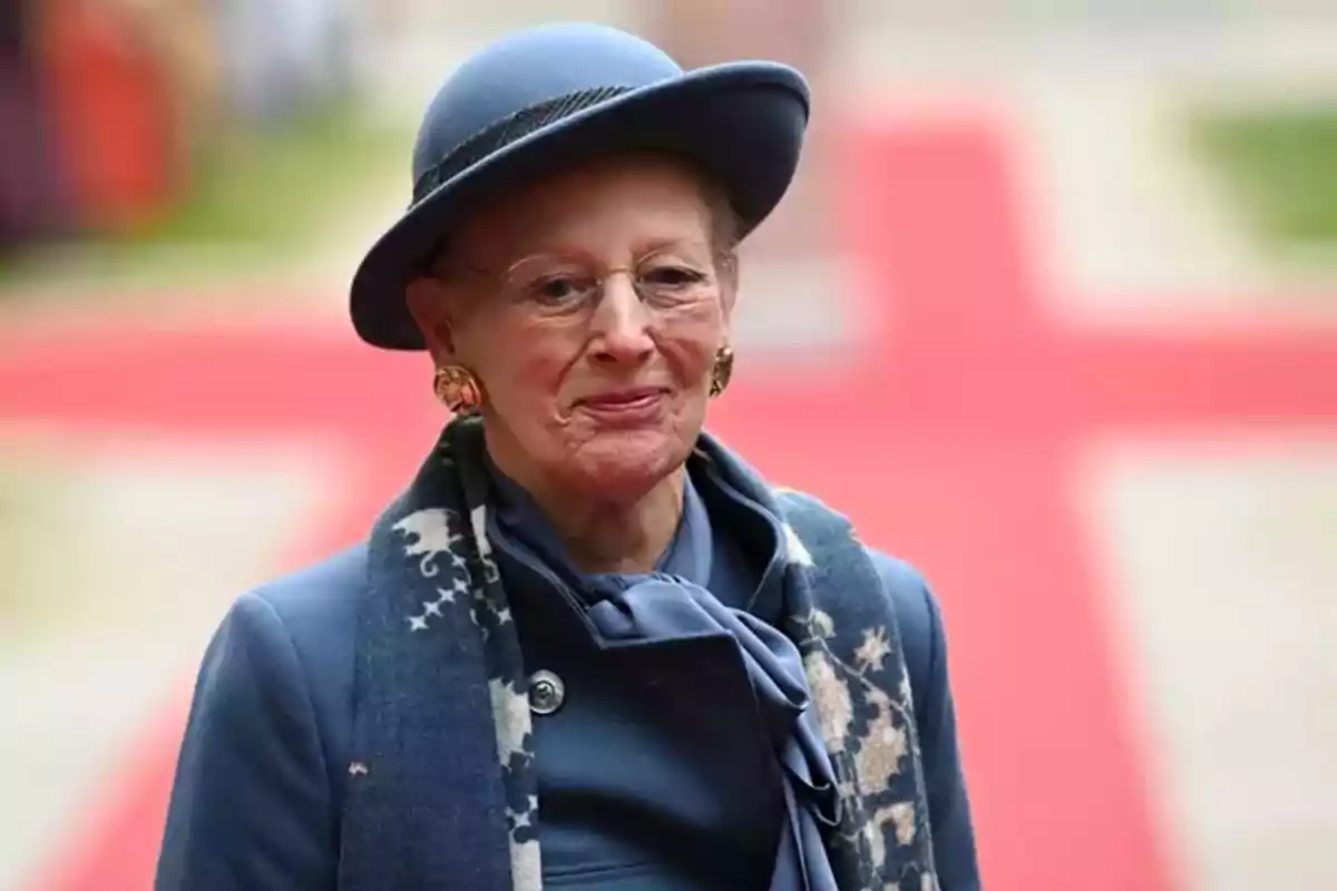 Queen Margaret of Denmark with blue hat and decorated scarf. Queen Margaret of Denmark with blue hat and decorated scarf.