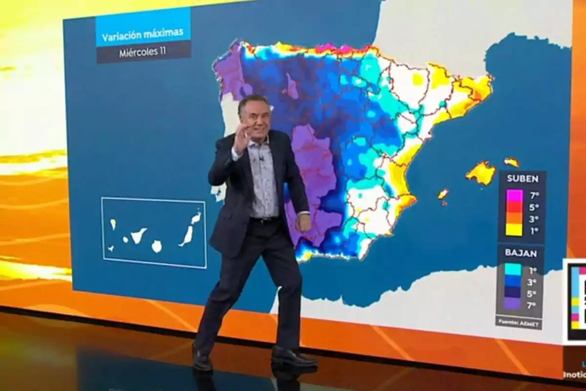 Roberto Brasero señalando un mapa de España con variaciones de temperatura representadas en diferentes colores. Roberto Brasero señalando un mapa de España con variaciones de temperatura representadas en diferentes colores.
