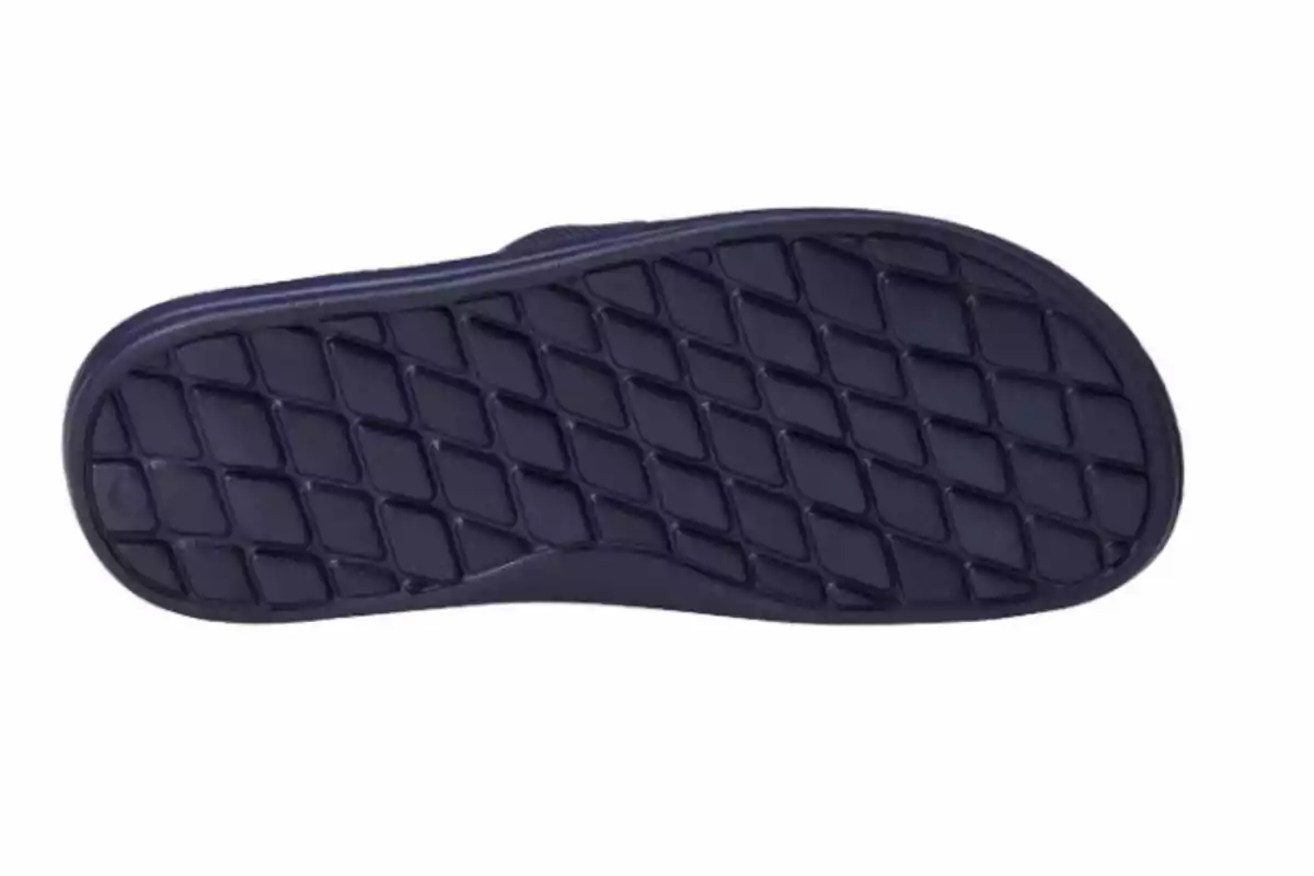 Suela de zapato color negro con patrón de rombos entrecruzados Suela de zapato color negro con patrón de rombos entrecruzados